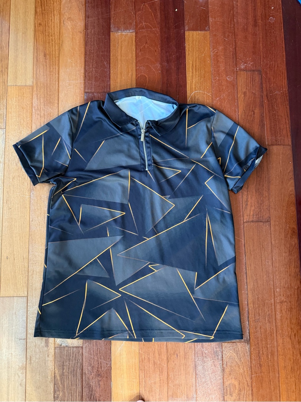 Men's Black Polo with Gold Geometric Accents - Performance Short Sleeve